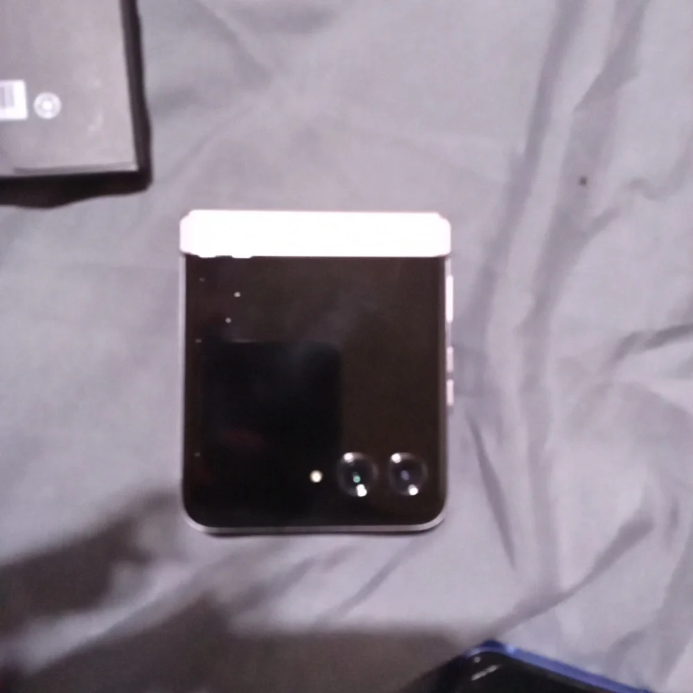 Motorola Smartphone with Blue and Purple Accents Come With A Purple Phone Case